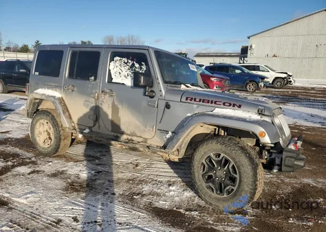 2015 Jeep Wrangler Unlimited Rubicon из США, поврежденный, VIN 1C4HJWFGXFL670248